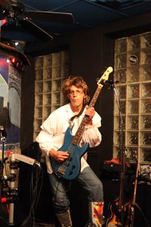 John posing with his blue guitar